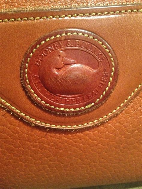 dooney and bourke green duck charm fake or real|dooney and bourke authenticity.